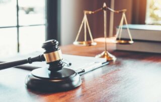 what is sexual assault legal books on desk with gavel